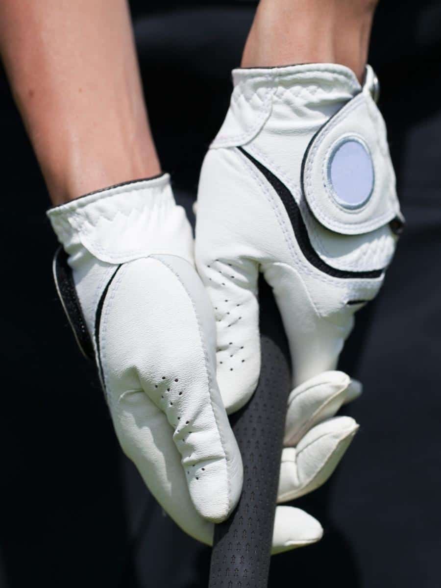 Golfer Wearing Gloves on Both Hands. Can You Wear Two Golf Gloves?

