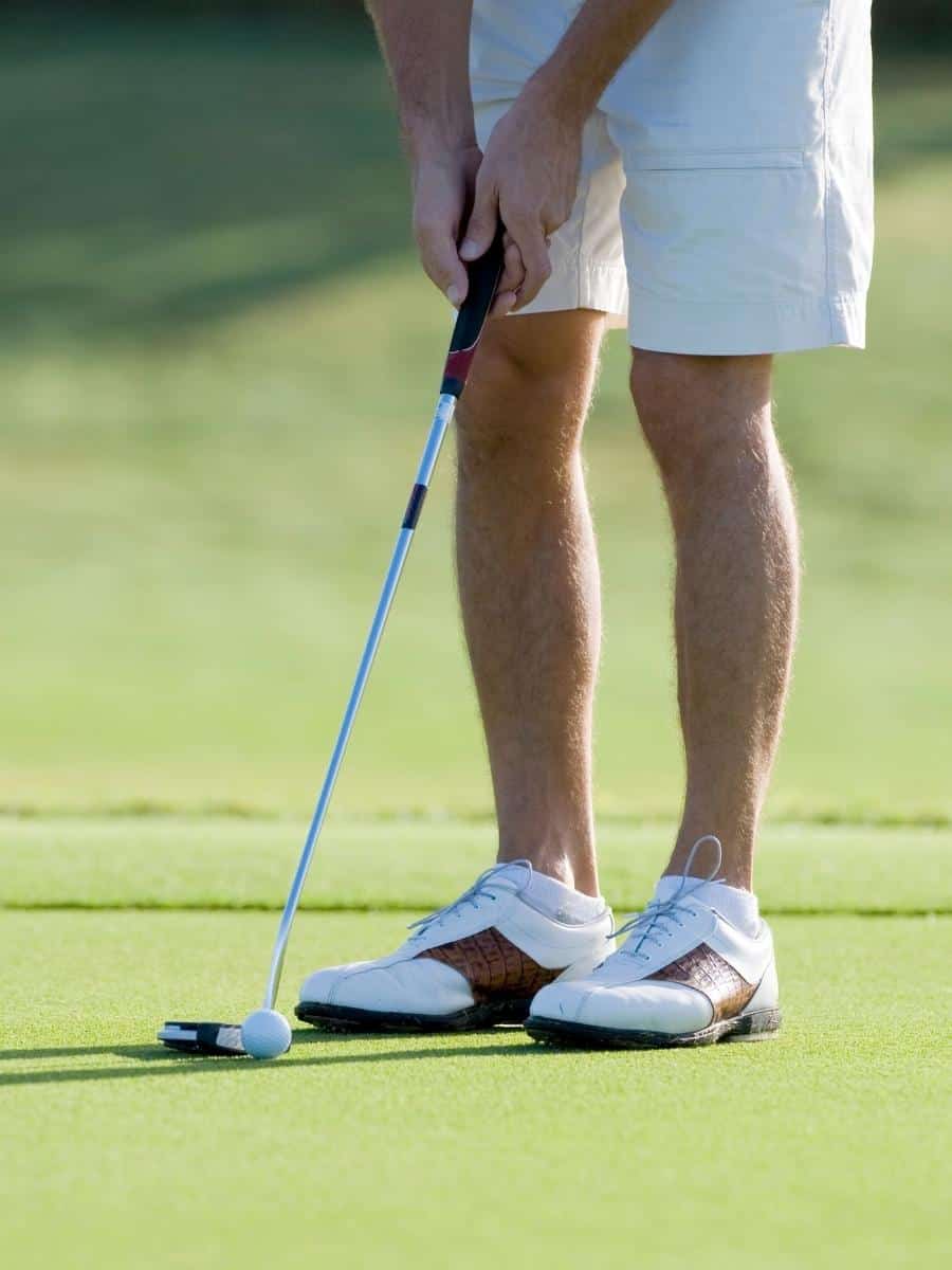 Golfer About To Putt